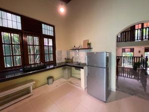 Η κουζίνα ή μικρή κουζίνα στο Peacock Paradise