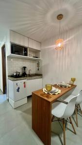 Η κουζίνα ή μικρή κουζίνα στο Flat Luxuoso Porto de Galinhas Cupe Exclusive #403 +11 φωτογραφίες