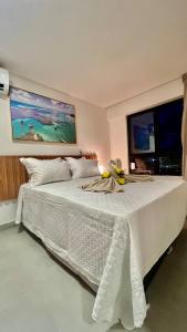 Ένα ή περισσότερα κρεβάτια σε δωμάτιο στο Flat Luxuoso Porto de Galinhas Cupe Exclusive #403