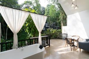 Balkón nebo terasa v ubytování Inthada At Mae Kampong Chiang Mai