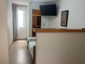 TV o dispositivi per l'intrattenimento presso Hotel Portal Guatapé