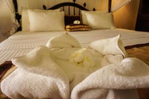 Katil atau katil-katil dalam bilik di Rest House Matara