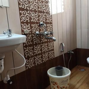 Koupelna v ubytování Hotel Sai Nanda