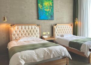 Letto o letti in una camera di Suzhou Unique Space Design Art Hotel