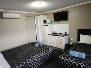 Μια τηλεόραση ή/και κέντρο ψυχαγωγίας στο Narrabri Motel and Caravan Park