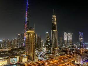 Nespecifikovaný výhled na destinaci Dubaj nebo výhled na město při pohledu z apartmánu