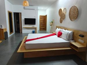 Postel nebo postele na pokoji v ubytování Villas Rocher Suite 3 C + 12 fotografií