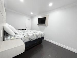 TV a/nebo společenská místnost v ubytování Uptown Inn + 18 fotografií