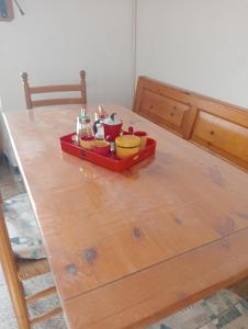 a toy kitchen with a tray on a wooden table at Il nido luminoso in Riomaggiore +24 photos