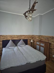 Postel nebo postele na pokoji v ubytování Gästehaus Hein + 1 fotografie