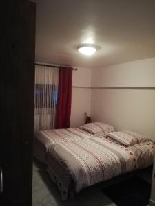 Postel nebo postele na pokoji v ubytování Gîte au coeur d'un joli village de Seine et Marne