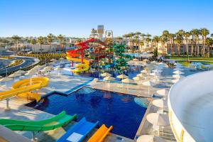 a water park with a water slide and slides at Beach Albatros Aqua Park - Hurghada in Hurghada