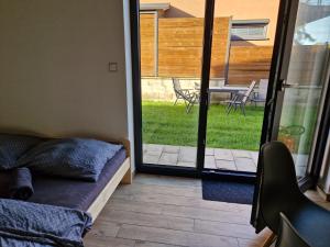 Posezení v ubytování Moderní byt v Relax Vila Lipno u pláže Windy Point