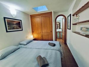 Posteľ alebo postele v izbe v ubytovaní La Orotava vacational rental home