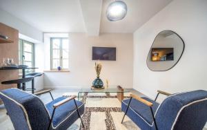 TV a/nebo společenská místnost v ubytování L'aventurière