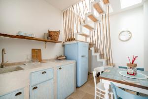 Kuchyň nebo kuchyňský kout v ubytování Apulia Charming Suites - Casa Lonfo Suite Sole