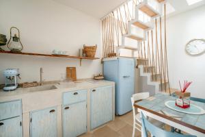 Kuchyň nebo kuchyňský kout v ubytování Apulia Charming Suites - Casa Lonfo Suite Sole