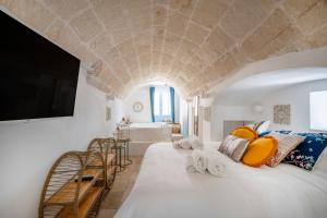 Postel nebo postele na pokoji v ubytování Apulia Charming Suites - Casa Lonfo Suite Sole