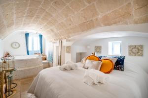 Postel nebo postele na pokoji v ubytování Apulia Charming Suites - Casa Lonfo Suite Sole