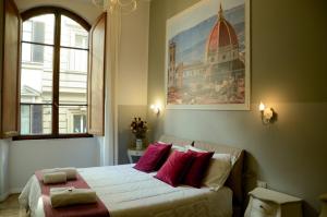 Posteľ alebo postele v izbe v ubytovaní B&B Dimora Sassetti 6