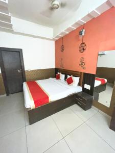 a hotel room with a bed and a sink at Royal Taj view in Agra