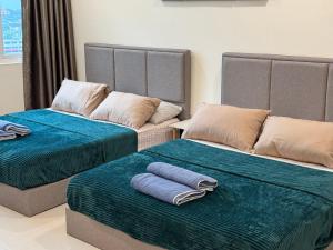 Ένα ή περισσότερα κρεβάτια σε δωμάτιο στο 4 Pax - Scenic Riverfront Studio A, Kuching City +45 φωτογραφίες