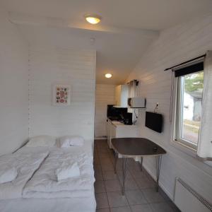 Kuchyň nebo kuchyňský kout v ubytování Strandbyn - Destination Råbocka