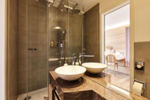 Un baño de Steinenschanze Charming City & Garden Hotel