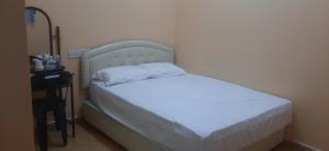 Postel nebo postele na pokoji v ubytování Wonderful Motel + 1 fotografie