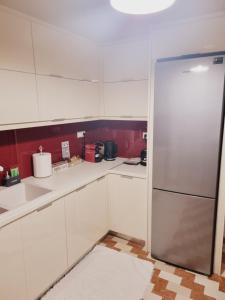 Kuchyň nebo kuchyňský kout v ubytování City Life Apartment