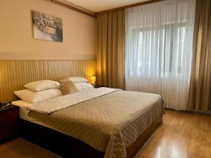 Katil atau katil-katil dalam bilik di Apartment & Room Monika