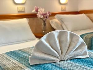 Postel nebo postele na pokoji v ubytování Hotel Crystal - SPIAGGIA INCLUSA con pacchetti personalizzati