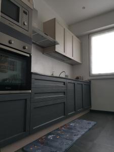 Køkken eller tekøkken på Garden Apartment Trento + 8 billeder