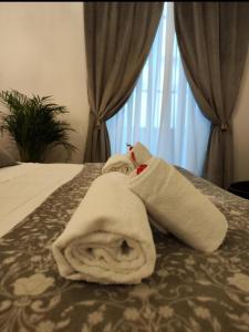 Posteľ alebo postele v izbe v ubytovaní B&B Dimora Sassetti 6