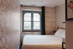 Posteľ alebo postele v izbe v ubytovaní Le Maje Hostel