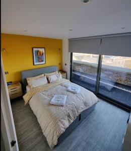 Ένα ή περισσότερα κρεβάτια σε δωμάτιο στο The Loft Margate