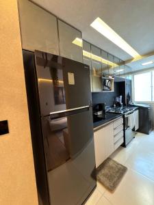 Køkken eller tekøkken på Apartamento Aracaju