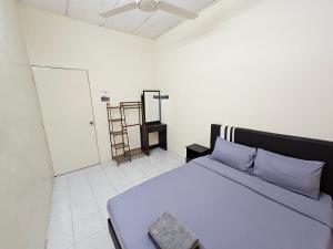 Postel nebo postele na pokoji v ubytování May Flower Hostel