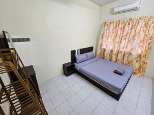 Postel nebo postele na pokoji v ubytování May Flower Hostel