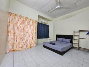 Postel nebo postele na pokoji v ubytování May Flower Hostel
