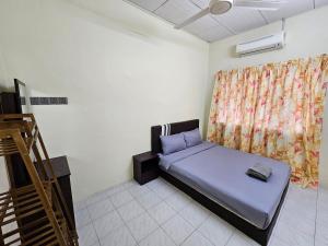 Postel nebo postele na pokoji v ubytování May Flower Hostel