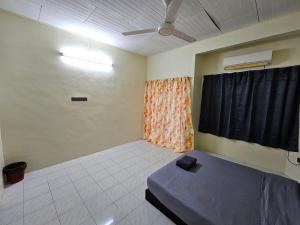 Postel nebo postele na pokoji v ubytování May Flower Hostel