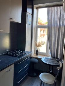 Kuchyň nebo kuchyňský kout v ubytování KVETa