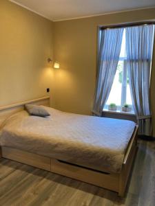 Postel nebo postele na pokoji v ubytování KVETa