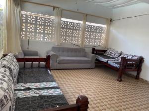 Posezení v ubytování Jacaranda road bnb + 18 fotografií