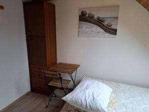 Postel nebo postele na pokoji v ubytování Hiša Bistrica