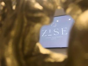 a close up of a bottle of zeus perfume at ZISE Luxury Apartments in Corfu +67 photos