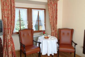 TV a/nebo společenská místnost v ubytování Hotel Leicht