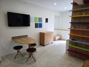 TV a/nebo společenská místnost v ubytování Apartment ARSO