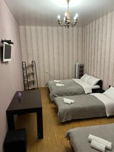 Postel nebo postele na pokoji v ubytování Geo tour + 17 fotografií